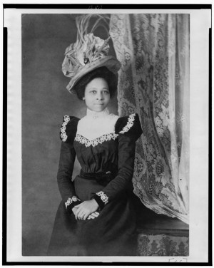 Young African American woman, three-quarter length portrait, facing ...