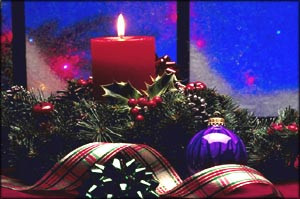 As Christmas candles brighten the room, the spirit of Christmas ...