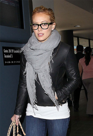 Mix a chunky scarf, leather jacket and funky glasses like Hilary Duff ...