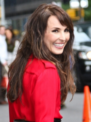 Noomi Rapace rocks enviably thick hair