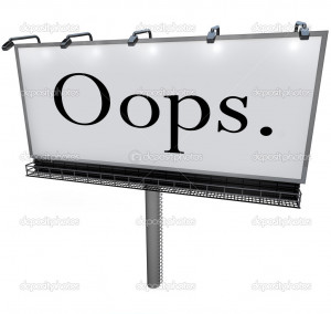 large white billboard with the word Oops alerting you to a public ...