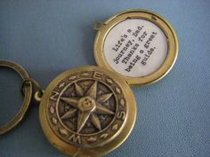 ... Compass Locket keychain with quote inside Life is a journey. Thank