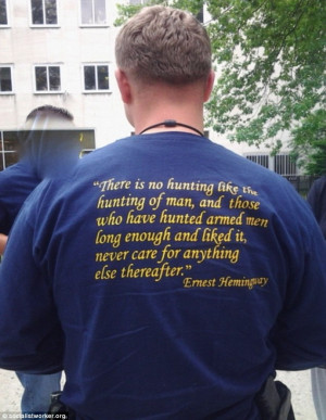 officers can be seen wearing t-shirts with a Ernest Hemingway quote ...