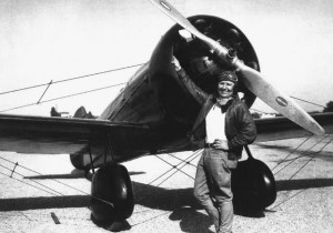 Pancho Barnes is on the far left, Amelia Earhart holds flowers
