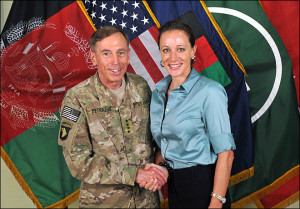 ... shows Gen. Davis Petraeus, left, shaking hands with Paula Broadwell