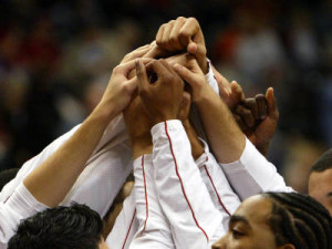 huddle and get pumped basketball players huddle basketball team huddle ...
