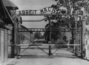 image shows the main gate of the Nazi concentration camp Auschwitz ...