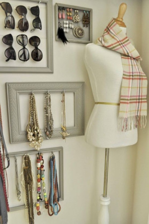 Closet wall - love that all the frames are the same neutral color