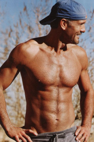 Tim McGraw poses shirtless for People Magazine