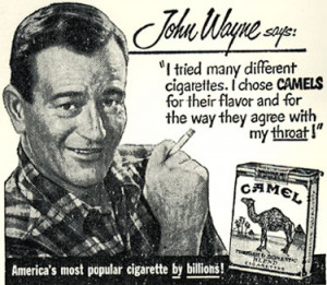 ... newspaper ad for Camel cigarettes with John Wayne picture and quote