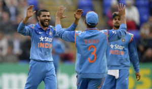 Ravindra Jadeja and Suresh Raina celebrate an England wicket in the ...