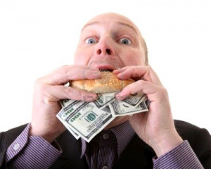 Image: 6095924-greed-businessman-eating-money-m...-white.jpg]