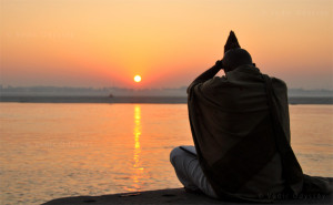 ... as the sun rises over the Ganges river in the town of Varanasi, India