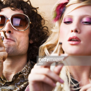 Royalty-free Image: Young Hippie Man and Woman Smoking Marijuana