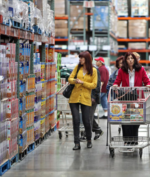 Shoppers browse items at a Costco Wholesale Corp. store in Chicago ...