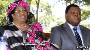 The ex-police chief sat by Joyce Banda as she formally announced Mr ...