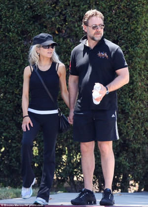 Athletic couple: Russell Crowe took wife Danielle Spencer for a walk ...