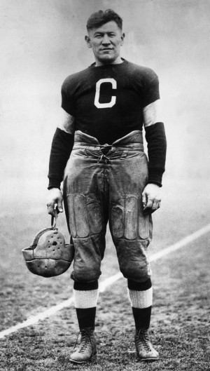circa 1915: American athlete Jim Thorpe posing in a football uniform ...