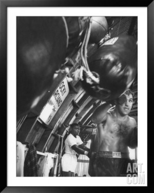 Rocky Marciano Punching Bag Boxer rocky marciano, working out punching ...