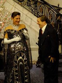 emerges from behind a partition wearing a dress] Remarkable ...