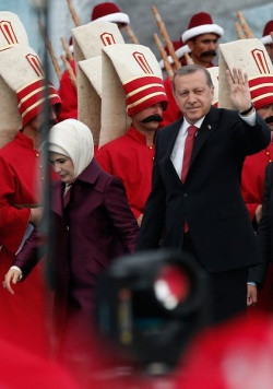 Turkish President Recep Tayyip Erdogan (R) and his wife Emine (L ...