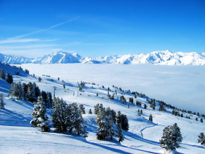 Winter background with a landscape with snow, trees and mountains