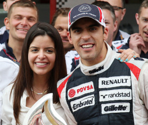 Pastor Maldonado celebrates with his girlfriend Gabriella Tarkany