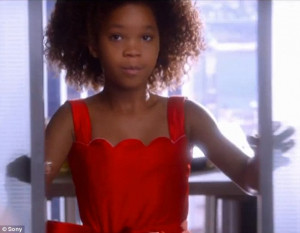 ... one scene, Wallis dons a modern version of Annie's classic red dress