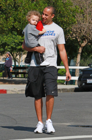 Hank+Baskett+holds+adorable+son+Hank+Jr+while+wtOBXNVuNFUl.jpg