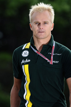 Heikki Kovalainen arrives in the paddock