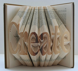 Isaac Salazar makes book sculptures that spell words.