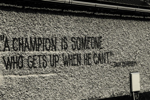 Poster>> A champion is someone who gets up when he can’t. Jack ...