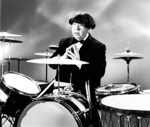 Alfred Hitchcock impersonating Ringo Starr, 1964.