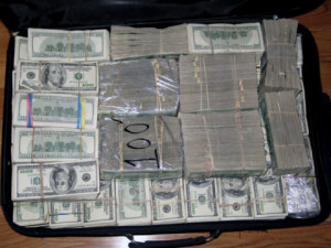 The money found hidden inside walls, suitcases and closets in one of ...