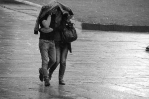 Couple love in rain black and white photo