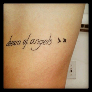 of angels” quote is tattooed in a non-connected cursive handwriting ...