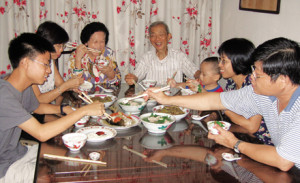 family dinner - a Chinese family eating dinner.