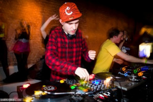 DJ incorporating vinyl records into his set
