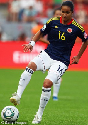 Adversaries: Wambach, left, had a run-in with Andrade, right, during ...