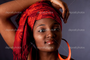 African woman with headwrap - Stock Image