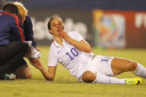 Carli Lloyd got a bloody nose when she collided with a player from ...