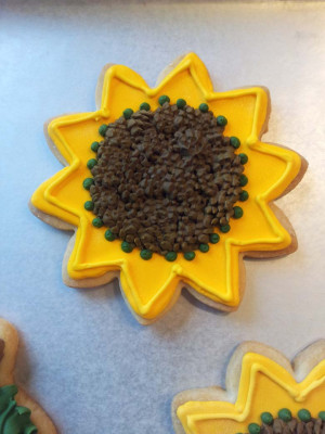 Close up of sunflower shortbread cookie.