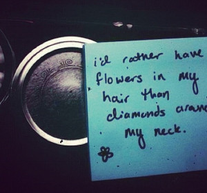 rather have flowers in my hair than diamonds around my neck ...