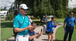 Zach Johnson stops to take a picture of PGA Championship officials ...