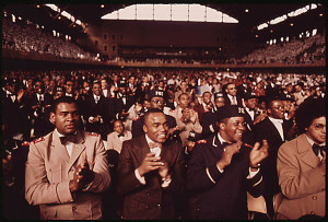 crowd of Black Muslims applaud during Elijah Muhammad's annual ...