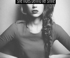 Quotes About Hiding Behind A Smile She hides behind her smile