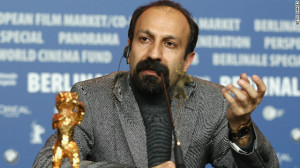 Asghar Farhadi speaks after winning the Golden Bear prize for his film ...