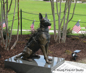 The statue depicts a life-size Belgian Malinois wearing his full ...