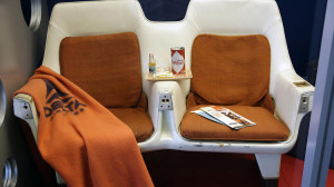 and first ceo c e woolman the display includes a portrait of woolman ...