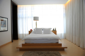Keep the headboard low. The headboard of this bed just lines up ...